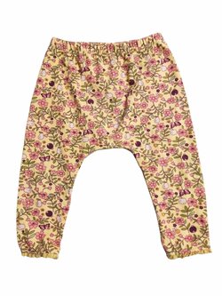 Žluté elasťáky s kytičkami pro holky secondhand Next Žluté elasťáky s kytičkami pro holky secondhand Next