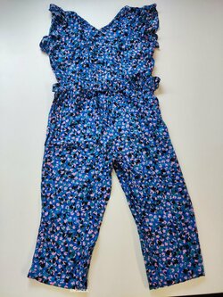 Tmavě modrý overal pro holky s kytičkami secondhand Tmavě modrý overal pro holky s kytičkami secondhand