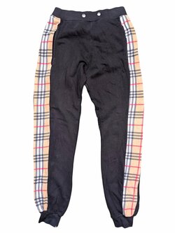 Černé tepláky s pruhy pro kluky secondhand 