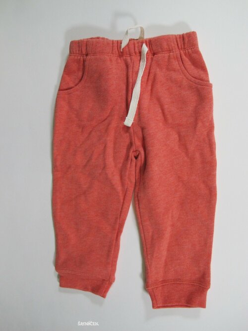 Oranžovo červené tepláky  secondhand